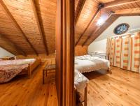 A bed or beds in a room at Borsalino Studios & Apartments