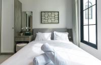 Greenforest Anahata Villa Resortにあるベッド