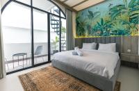 Greenforest Anahata Villa Resortにあるベッド