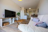 Televízia a/alebo spoločenská miestnosť v ubytovaní Balcones de Benalmadena