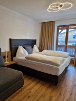 Łóżko lub łóżka w pokoju w obiekcie Apartmenthaus Kristall