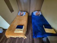 Postel nebo postele na pokoji v ubytování Travel House Wroclaw