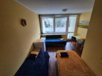 Postel nebo postele na pokoji v ubytování Travel House Wroclaw