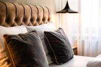Łóżko lub łóżka w pokoju w obiekcie Vayalen Boutique Hotel