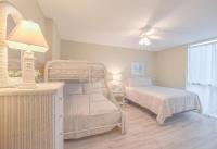 Ein Bett oder Betten in einem Zimmer der Unterkunft Shoreline Towers #3022