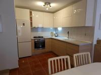 Kuchyň nebo kuchyňský kout v ubytování House Linda2