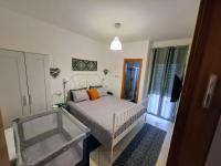 Ein Bett oder Betten in einem Zimmer der Unterkunft shohamseaview