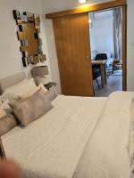 Postel nebo postele na pokoji v ubytování Apartments iris
