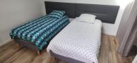 Posteľ alebo postele v izbe v ubytovaní Villa l'Eden de Camargue- Spa et Nature