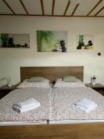 Postel nebo postele na pokoji v ubytování Apartmán Na Ostrově Beroun