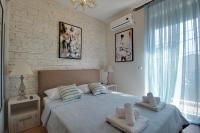 Posteľ alebo postele v izbe v ubytovaní Luxury 2br apartment 50m from beach