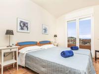 Posteľ alebo postele v izbe v ubytovaní Holiday Home Xarmada Marco by Interhome