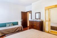 A bed or beds in a room at Villa Bel Giardino