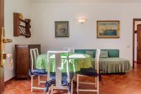 A bed or beds in a room at Villa Bel Giardino