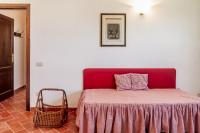 A bed or beds in a room at Villa Bel Giardino