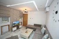TV a/nebo společenská místnost v ubytování Sea & city house