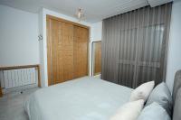 Postel nebo postele na pokoji v ubytování Sea & city house