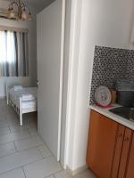 a kitchen with a sink and a counter top at Theofanis Studios in Agia Anna Naxos