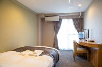 HOTEL CITY INN WAKAYAMA 和歌山駅前にあるベッド