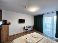Posteľ alebo postele v izbe v ubytovaní Apartament 38 i 37 Okrzei 1c