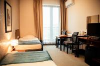Posteľ alebo postele v izbe v ubytovaní Hotel Kuracyjny Spa & Wellness