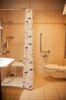 Kúpeľňa v ubytovaní Hotel Kuracyjny Spa & Wellness