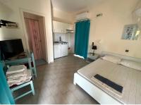 Postel nebo postele na pokoji v ubytování Tersanas Beach Apartments