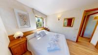 Posteľ alebo postele v izbe v ubytovaní Apartaments Boutique la Torreta del Llac