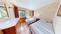 Posteľ alebo postele v izbe v ubytovaní Apartaments Boutique la Torreta del Llac