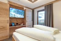 Posteľ alebo postele v izbe v ubytovaní Gäste-Appartementhaus - Urlaubsresort Hafele