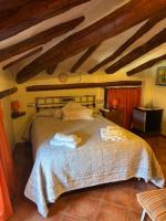 Postel nebo postele na pokoji v ubytování Hotel Casa de la Fuente