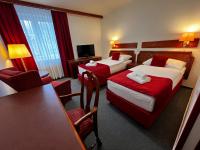 Postel nebo postele na pokoji v ubytování Hotel Bohemia Excellent