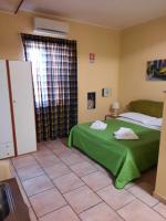 Posteľ alebo postele v izbe v ubytovaní Hotel Sirio