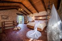 A bed or beds in a room at Ktima Kourou