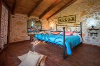 A bed or beds in a room at Ktima Kourou