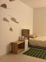 Ichon Green Tea Houseにあるベッド