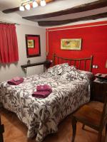 Postel nebo postele na pokoji v ubytování Hotel Casa de la Fuente