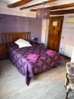 Postel nebo postele na pokoji v ubytování Hotel Casa de la Fuente