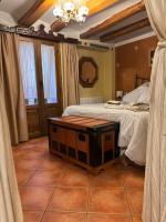 Postel nebo postele na pokoji v ubytování Hotel Casa de la Fuente