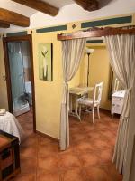 Postel nebo postele na pokoji v ubytování Hotel Casa de la Fuente