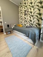 Posteľ alebo postele v izbe v ubytovaní Apartamenty Cieplicka 20a