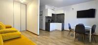 Kuchyňa alebo kuchynka v ubytovaní Apartamenty Miku