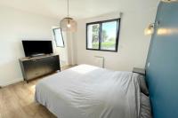 Televízia a/alebo spoločenská miestnosť v ubytovaní Duplex neuf Hyper Design - Piscine chauffée