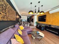 A television and/or entertainment centre at Magma Paraiso Royal