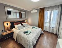 A bed or beds in a room at Magma Paraiso Royal