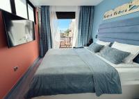 A bed or beds in a room at Magma Paraiso Royal