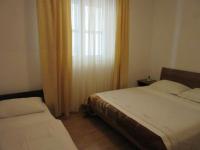 Posteľ alebo postele v izbe v ubytovaní Petar Apartments