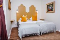 Postel nebo postele na pokoji v ubytování Hotel Lysekil