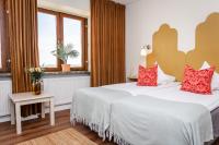 Postel nebo postele na pokoji v ubytování Hotel Lysekil