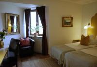 Postel nebo postele na pokoji v ubytování Hotel Lysekil